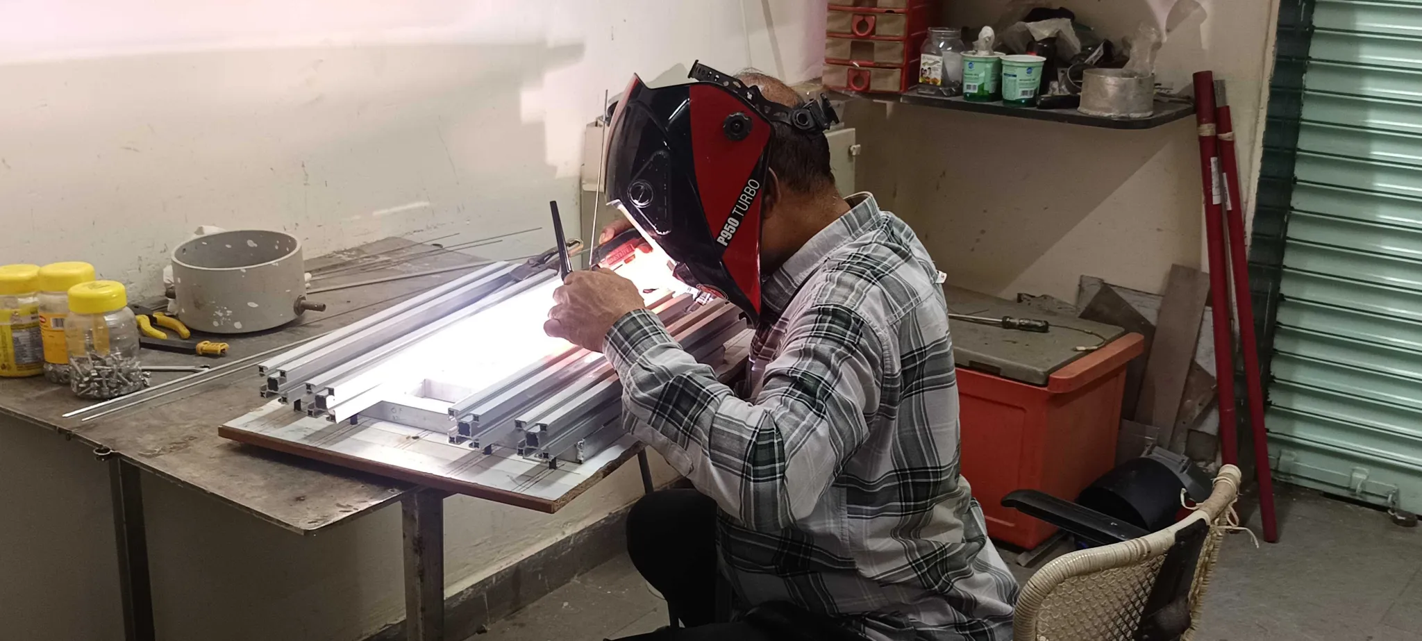 Welding the aluminium chassis on the jig